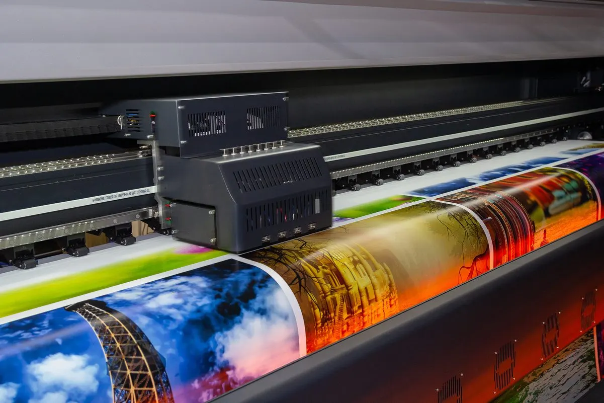 Large-format printer running a full-colour job at the Universal Enterprises workshop